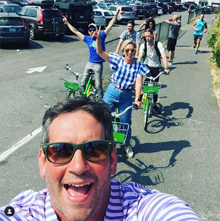 Aaron Shurts and Mentor team riding Lime Bikes on the Burke-Gilman Trail